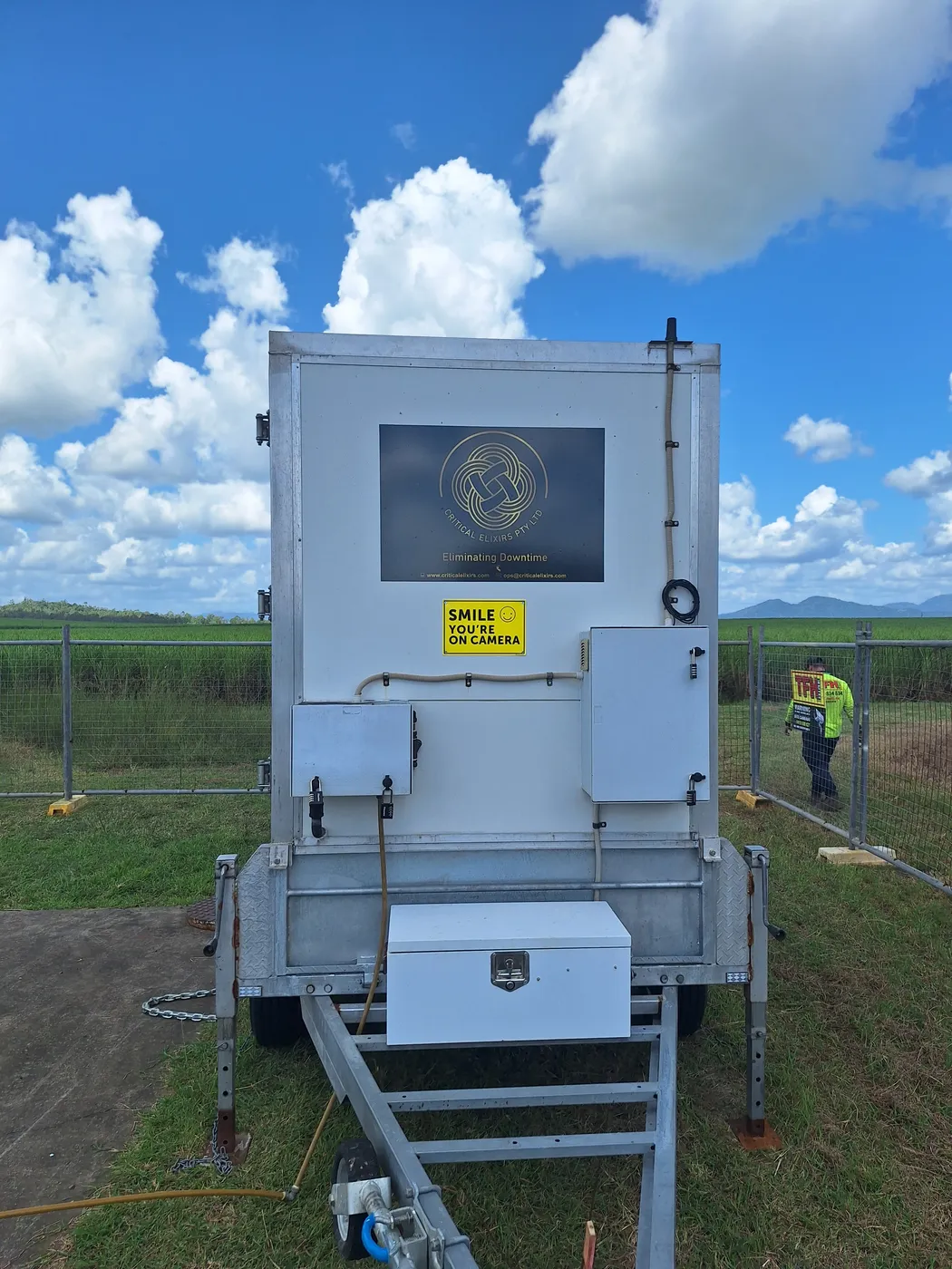 Front view of a Critical Elixirs trailer-mounted dosing station